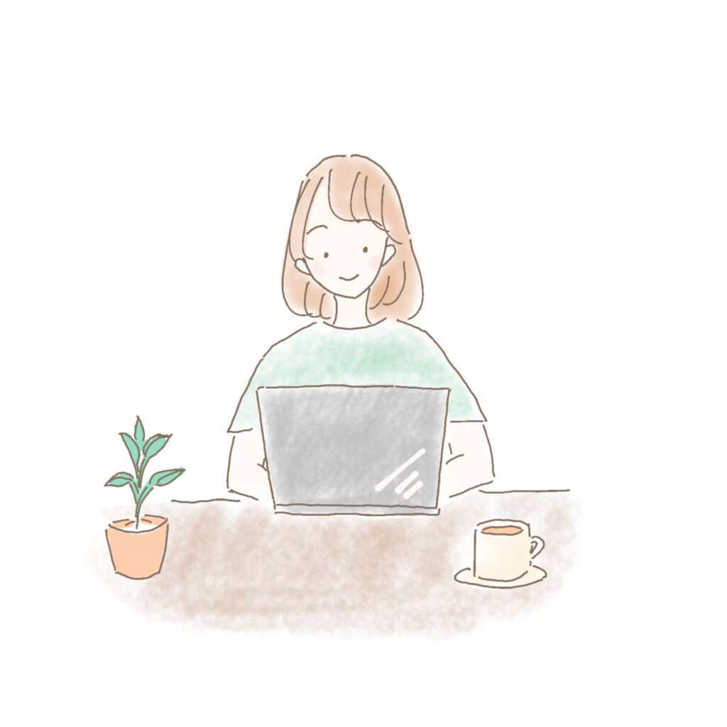 パソコンを開いて画面を見ている女性